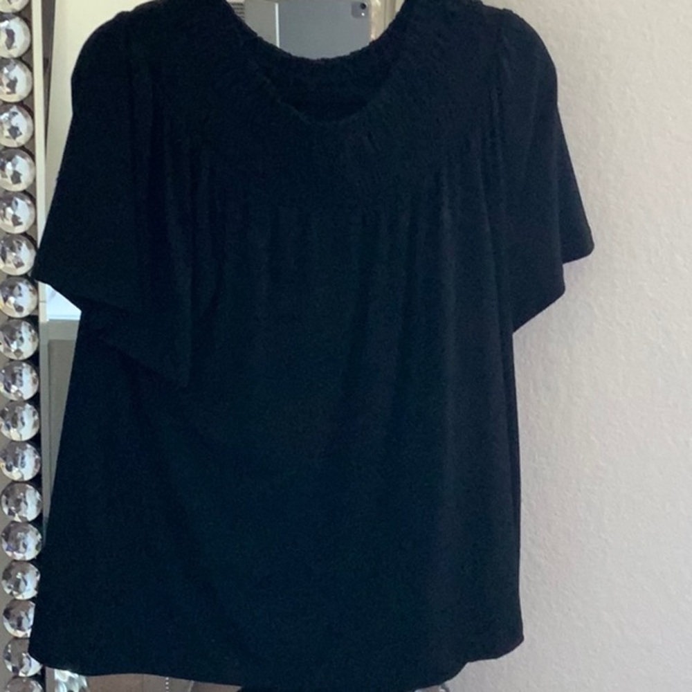 Top Black.  Polyester and spandex